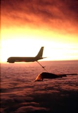 A KC-135 from the 22nd Air Refueling Wing refuels a B-2 Spirit from the 509th Bomb Wing