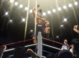Takamura_celebrating_his_debut_match_victory