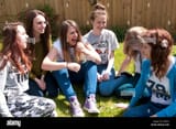 happy-group-of-teenage-girls-laughing-EY85C6-2459333718
