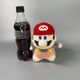 Funny plush Mario with drinky