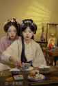 Yin-Yin and Miao serving tea_thumb.jpg