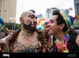 mexico-city-mexico-23rd-june-2018-two-men-participate-in-the-mexican-gay-pride-parade-soccer-fans-and-the-...-celebrated-together-after-mexicos-second-victory-in-the-fifa-world-cup-2018-credit-jess-alvaradodpaalamy-live-news-P52860