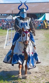 depositphotos_70385291-stock-photo-man-in-knight-armor-on