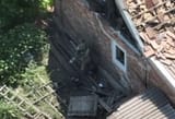 Russian soldier throws anti-tank mine into a house
