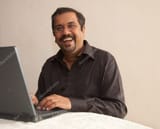 depositphotos_3017362-stock-photo-indian-man-with-computer