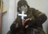 maskedmanholdingcross