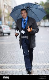 young-journalist-rushing-in-urban-city-for-breaking-news-E6KBJA