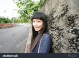 stock-photo-in-the-old-taiwan-lane-a-taiwanese-girl-travels-in-the-lane-1443838499