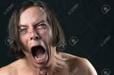 22115970-close-up-of-a-man-screaming-in-agony