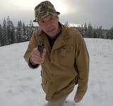 Paul Harrell pointing gun