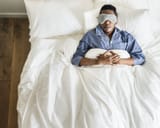 black-man-sleeping-bed-eye-mask