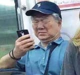 asian man on train