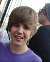 while that I hated his songs with passion, I must say he had an cute face of a twink