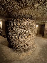 Paris-catacombs-pillar-of-skulls-Photo-by-JFPenn-768x1024