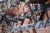 old-pirate-ship-cannons-dockyard-retro-style-toned-photo-41483239