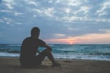 alone-man-looking-sunset-beach_431724-7297-1406246554