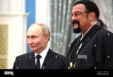 moscow-russia-30th-may-2024-russian-president-vladimir-putin-left-presents-russian-special-representative-for-russian-american-humanitarian-relations-actor-and-producer-steven-seagal-right-with-the-order-of-friend