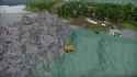 Heroic dump trucks save friend by dumping him up a hill.1200_thumb.jpg