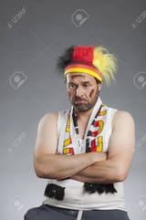 31397392-sad-german-soccer-fan-sitting-with-hands-folded