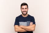 young-handsome-man-with-beard-isolated-keeping-arms-crossed-frontal-position_1368-132662