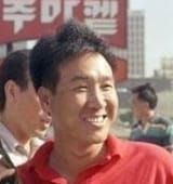 man-wearing-a-red-polo