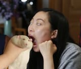 miao ying eats rat