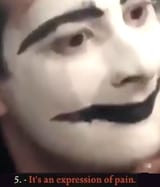 mime an expression of pain