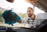 young-man-washing-windshield_jpg
