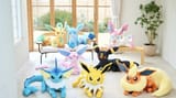 pokecen-online-lifesize-eeveelution-plush-sitting-apr242025-1-1038x576