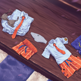 No humans, unworn clothes, wooden floor s-562735965