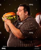 fat-man-eating-fast-food-hamberger-breakfast-for-overweight-person-KB89DR