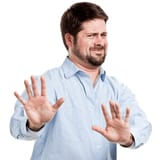 irritated-man-with-hands-out-in-stop-gesture.jpg (3)