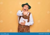 senior-grey-haired-man-wearing-german-traditional-octoberfest-suit-over-yellow-background-laughing-you-pointing-finger-to-226184679[1]