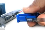 hand-plugging-vga-cable-connector-to-vga-port-2064090901