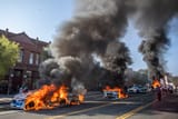 84113534007-waymo-fire-la-ice-protests-05
