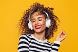 woman-listening-to-music-on-headphones