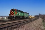 gp50_in_tigerstripe_hauling_the_burlington_northern_no__3_through_naperville__illinois__usa