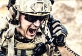 soldier-communicating-with-command-during-battle-picture-id981641830-969205277