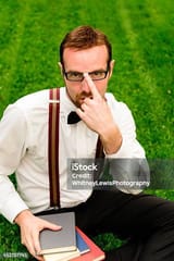 nerd-student-pushing-up-glasses