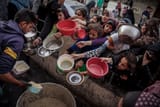 240112214658-food-distribution-gaza-refugee-camp-122823-1166285012