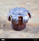 copper-jacketed-lead-bullet-after-the-hollow-point-has-flattened-H7MN0N-4249163246