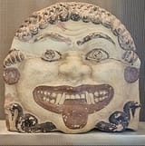 Gorgon-head_antefix_1_-_Acropolis_Museum