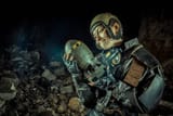 depositphotos_314337468-stock-photo-soldier-woman-with-the-bomb