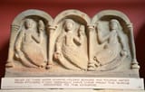 1200px-Relief_of_three_water_Nymphs_from_the_shrine_at_Carrawburgh,_Clayton_Museum,_Chesters_Roman_Fort,_Hadrian&#039;s_Wall_(44136880884)