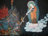 Gizo-decends-to-hell-on-a-lotus-throne-to-help-those-suffering-in-hell-Buddha-Weekly